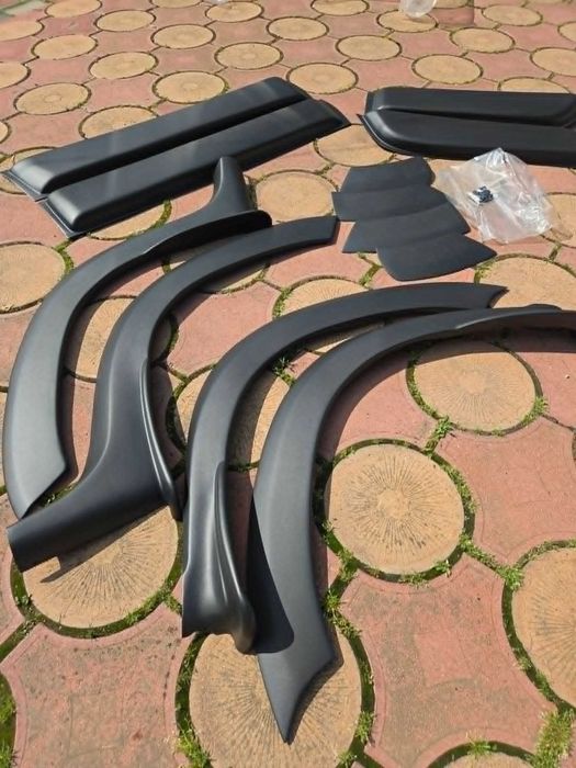 Set 12 Bandouri Laterale Protectii Bara Aripa USI Overfendere DACIA DUSTER I 2010-2017
