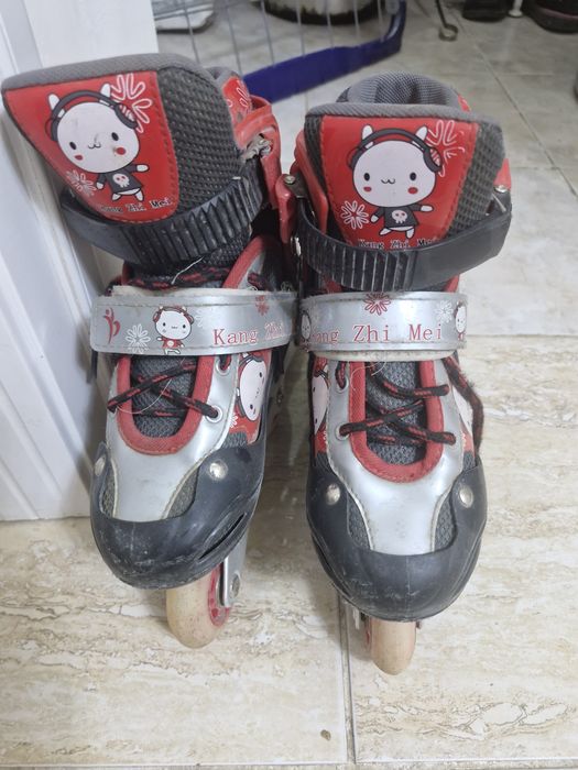 Роликовые коньки