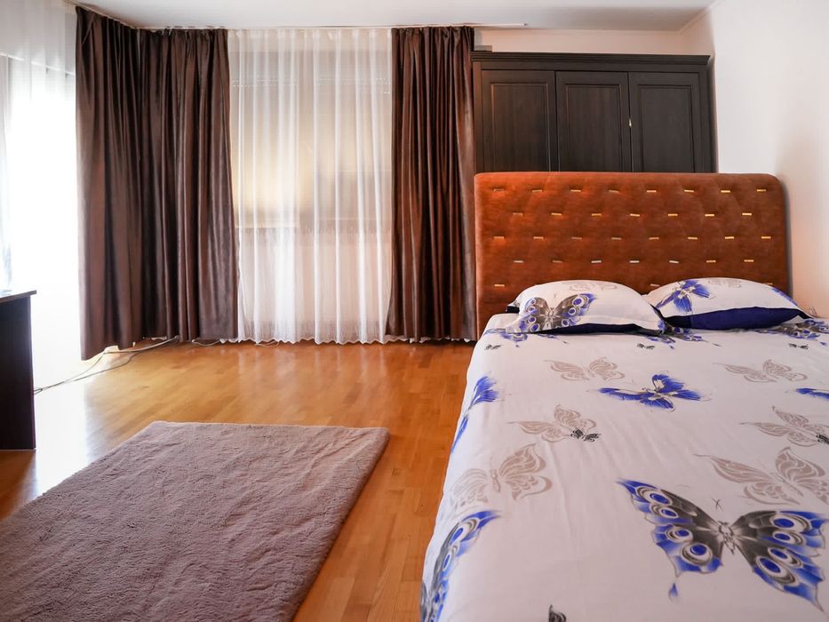 Casă de vânzare – 110 mp, curte spațioasă și grădină verde