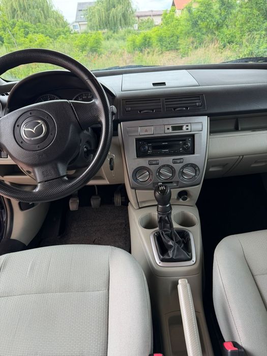 ATENTIE 62140 KM,Vând Mazda 2,An d⁸e Fabricație 2007,Motor 1,3 Litri Benzina