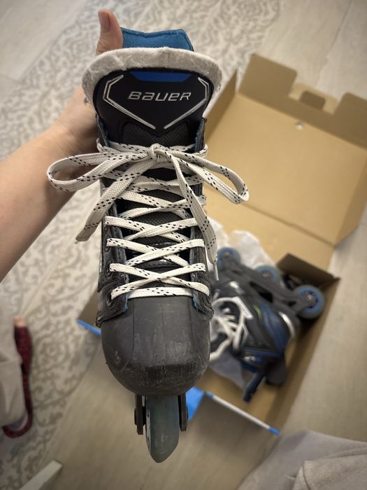 Роликовые коньки