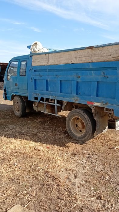 Жүкті өзі түсретін машина