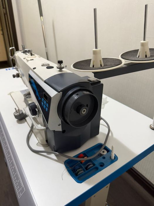 Новая швейная машина