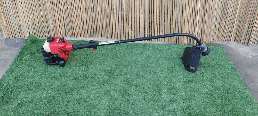 Бензинов тример .