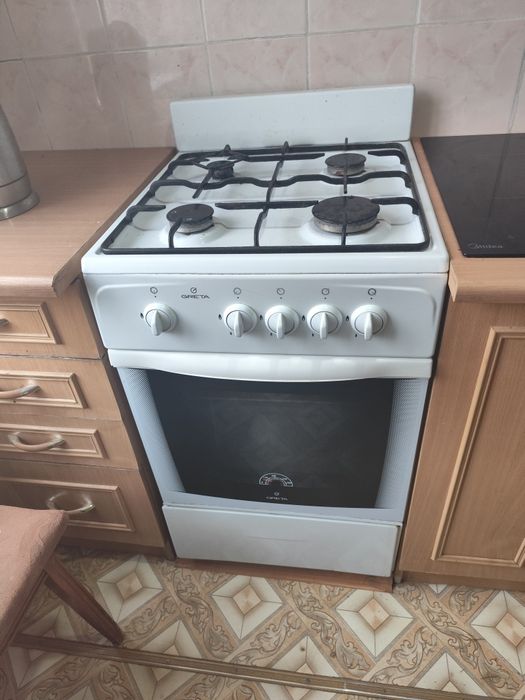 Газовая плита с духовкой