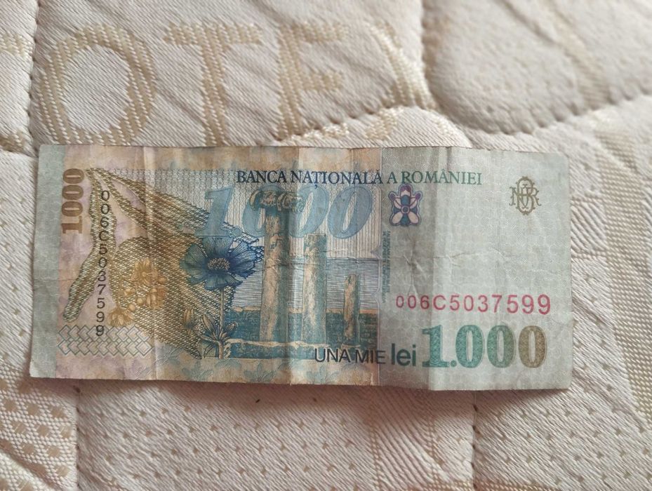 Bancnota una mie lei (bani vechi colecție) este in stare foarte buna