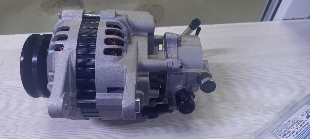 Генератор новый на Nissan TD27