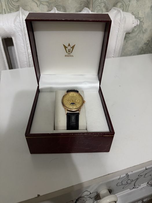 Продам золотые часы мужские