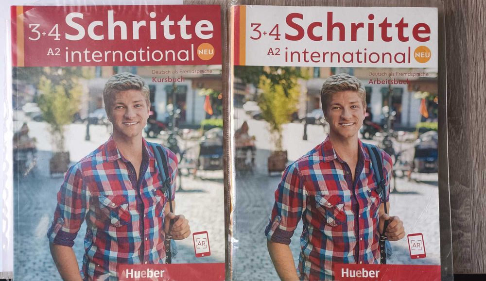 Учебник и тетрадка по НЕ за 11 и 12 клас