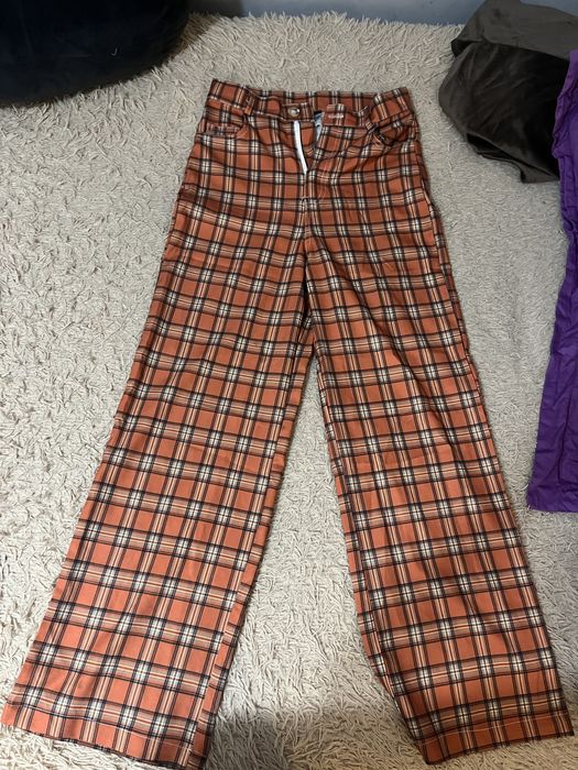 брюки клетчатые