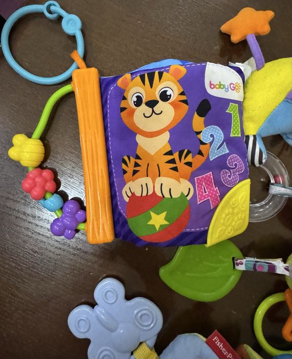 Подвесные игрушки в коляску манеж