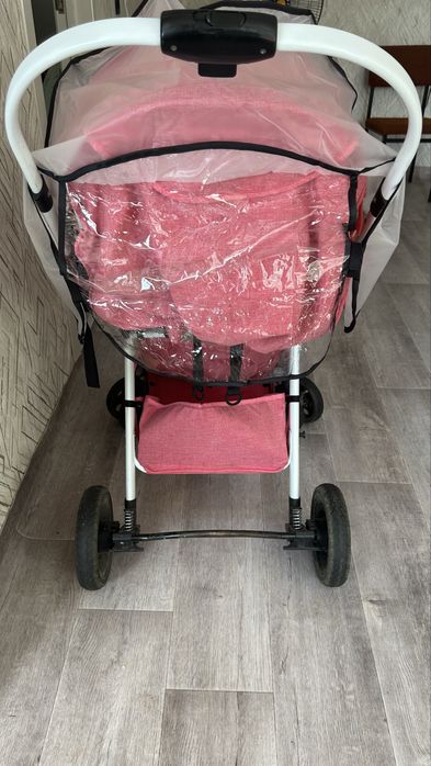 Продам коляску розовую