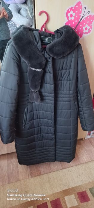 Продам пуховик женский