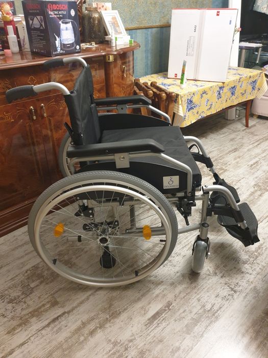 Инвалидная коляска