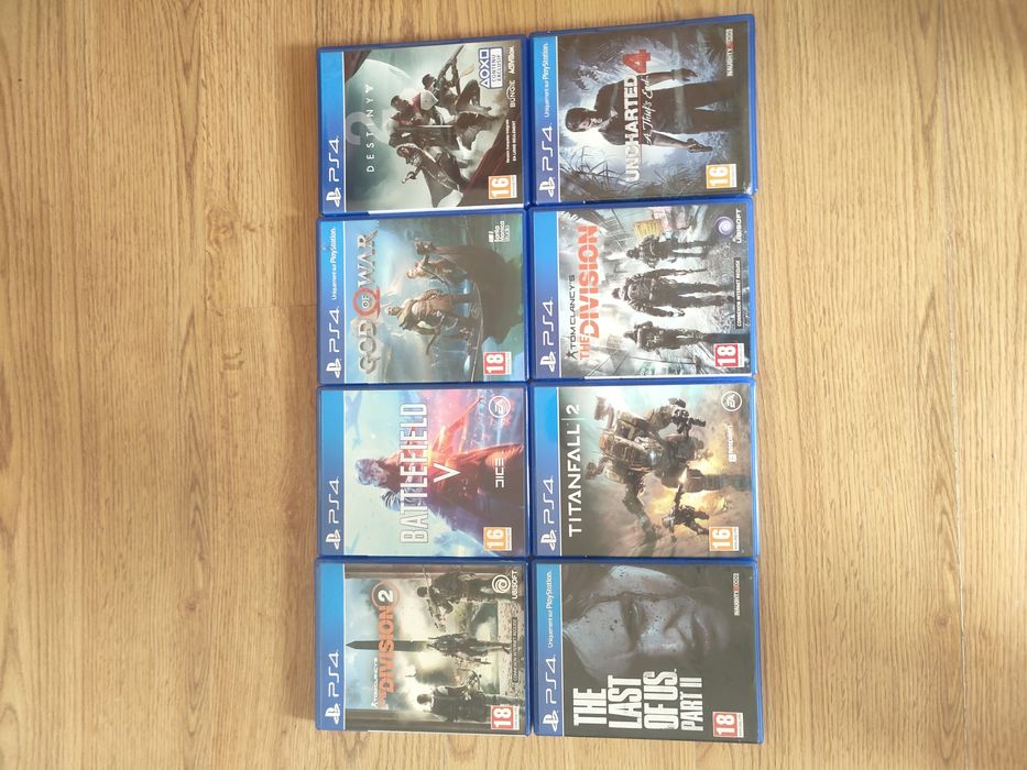 Vând PS4 PRO cu 1 TB statie de încărcare și 8 jocuri