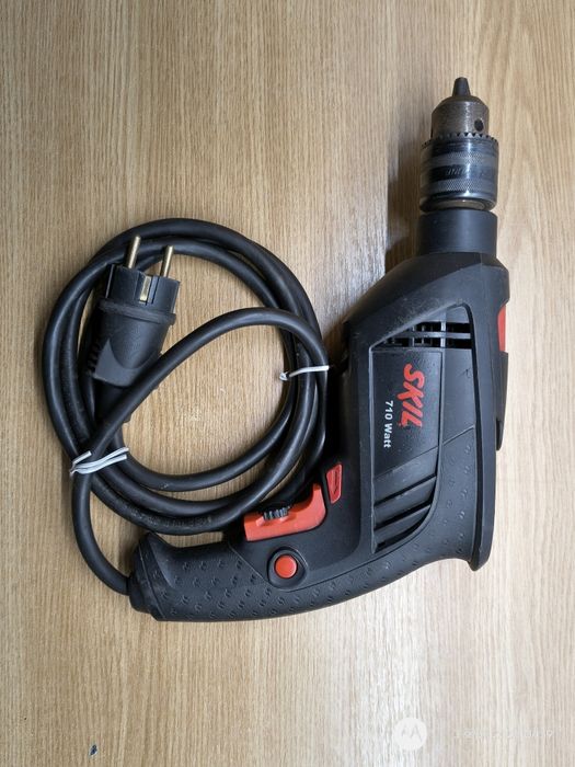 bormasina cu percuție  Skill 710W, impecabilă
