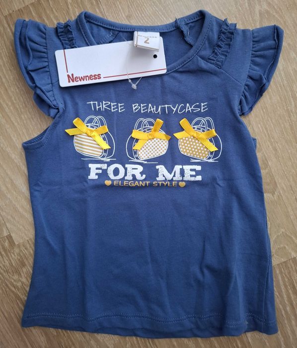 Детско облекло. Боболи-Newness (Испания).