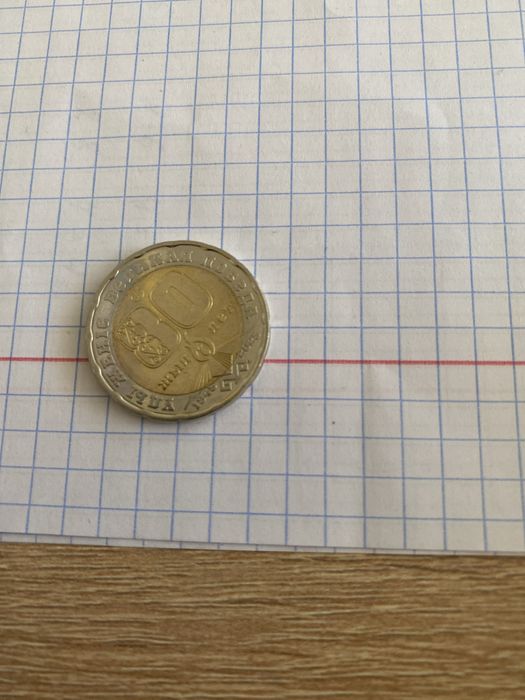 Продам монету 200 тг цену придлагайте сами