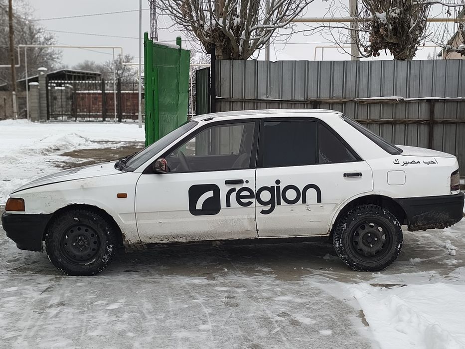 Машина Мазда рабочая лошадка