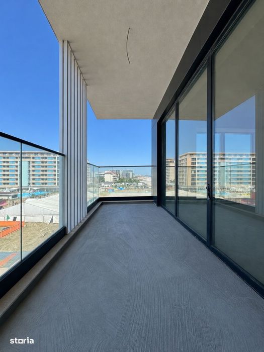 Finalizat | Apartament pe plaja cu vedere la mare in imobil premium