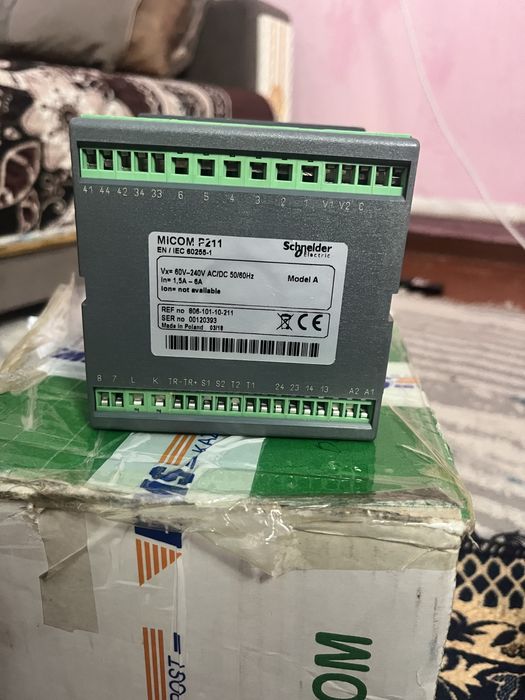 MiCOM P211 от Schneider Electric.