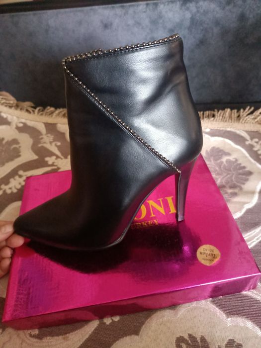 Продам осенние сапоги.