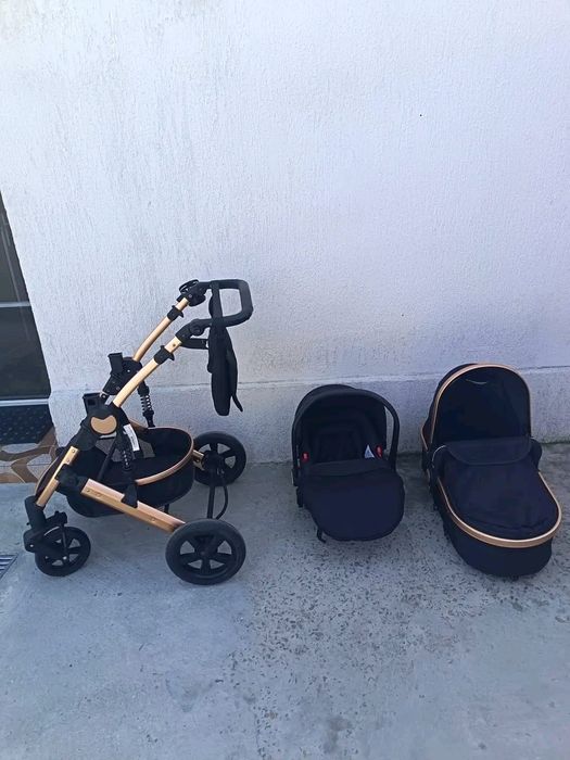 Carucior 3 in 1 cu suspensii duble