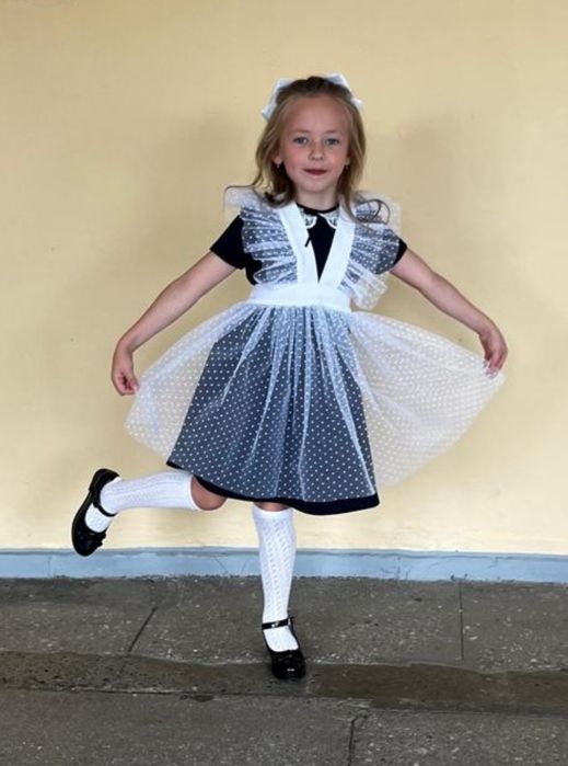 Новые школьные фартуки.