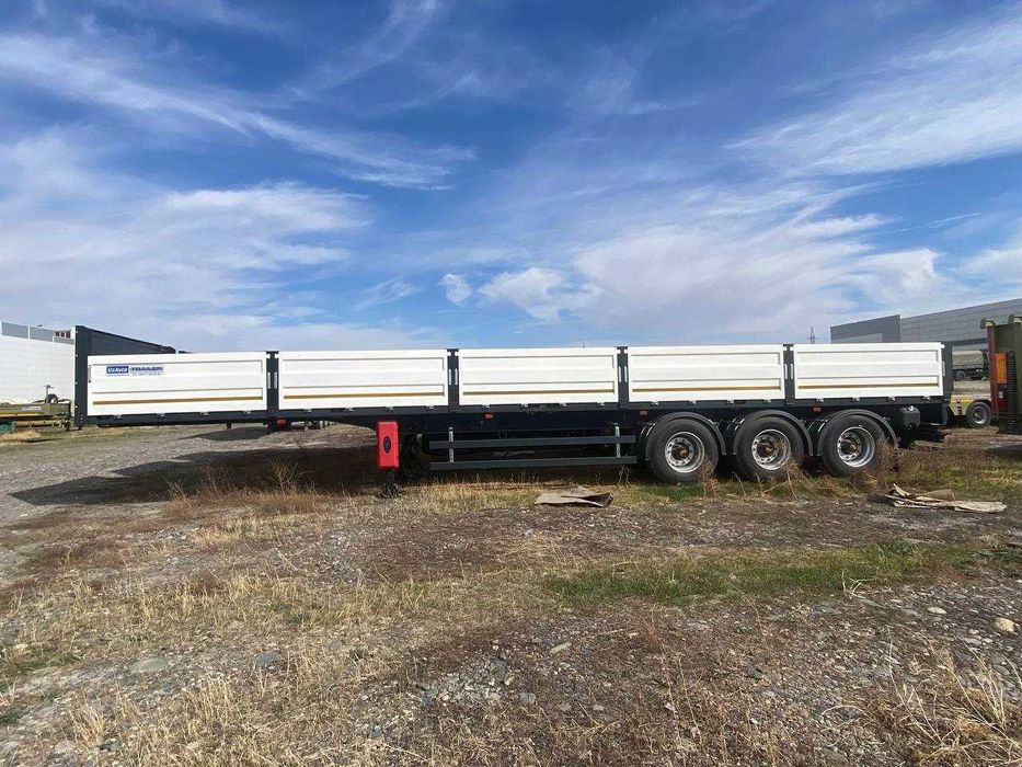 B наличии!!! Полуприцеп бортовой контейнеровоз UzAutoTrailer (2025)