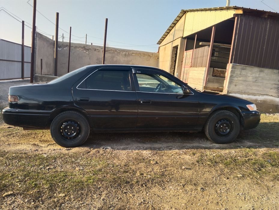 Автомобиль тайота камрй 20