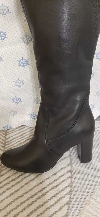 Продам новые сапоги