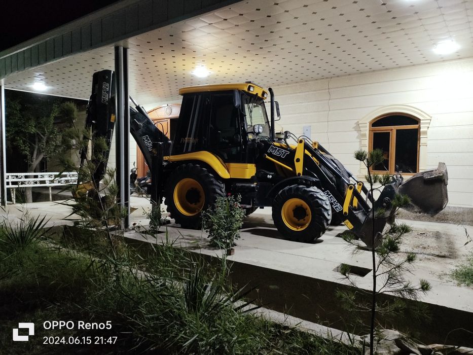 Экскаватор погрузчик МСТ М542