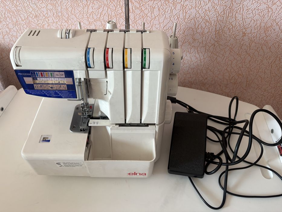 Janome оверлок elna