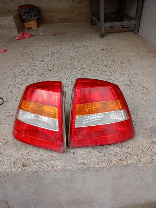 Faruri și stopuri Opel Astra G