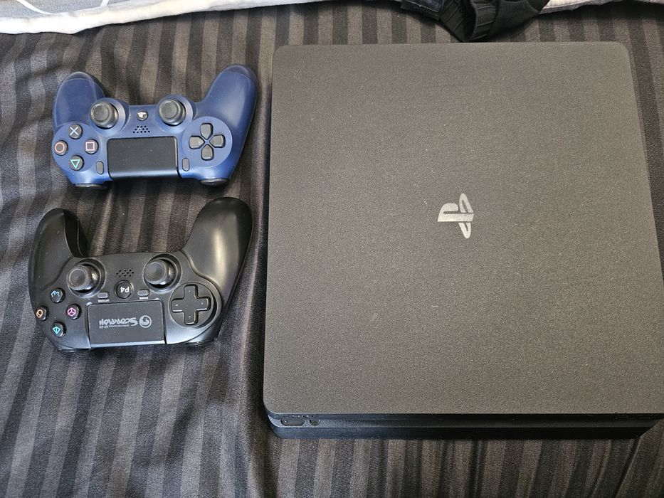PlayStation 4 slim 1tb + 9 jocuri 2 manete