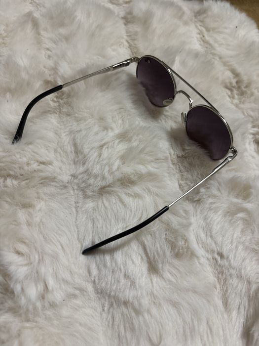 Vand ochelari de soare lacoste