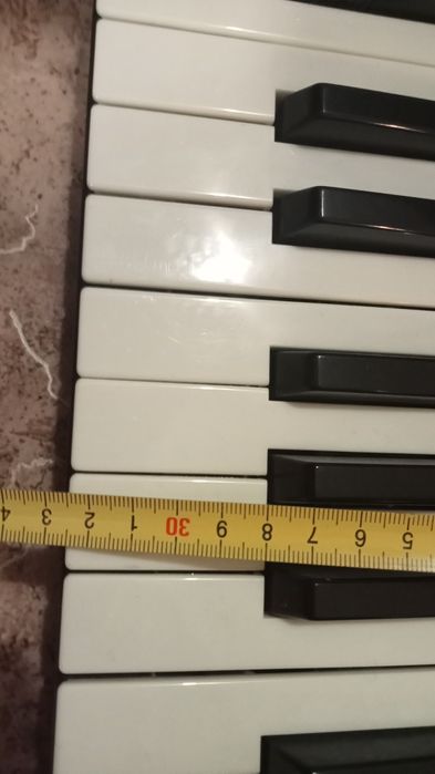 Музыкальный клавишный инструмент