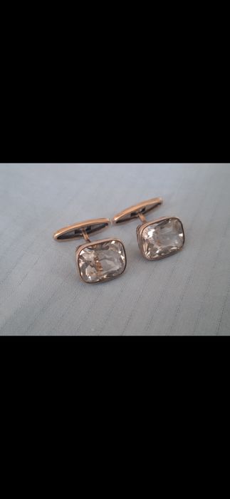 Запонки серебряные.