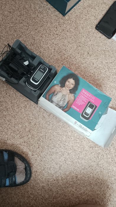 Продам телефоны , монеты разное