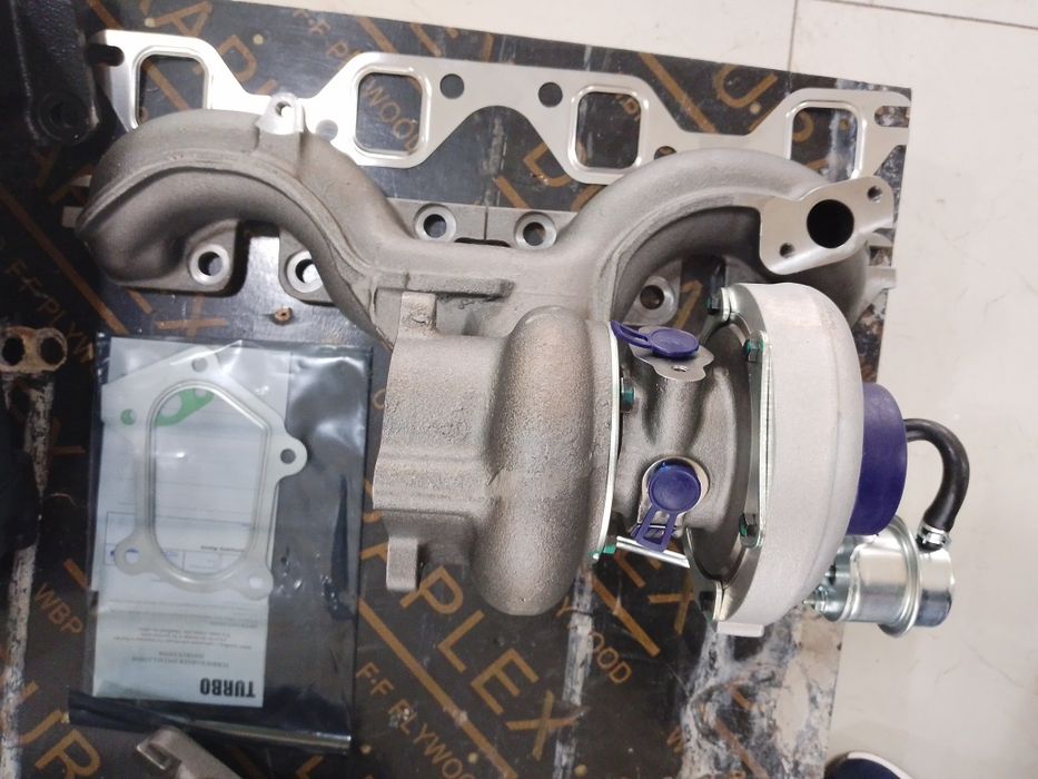 Турбина с коллекторам в комплекте 4HG1 NQR71