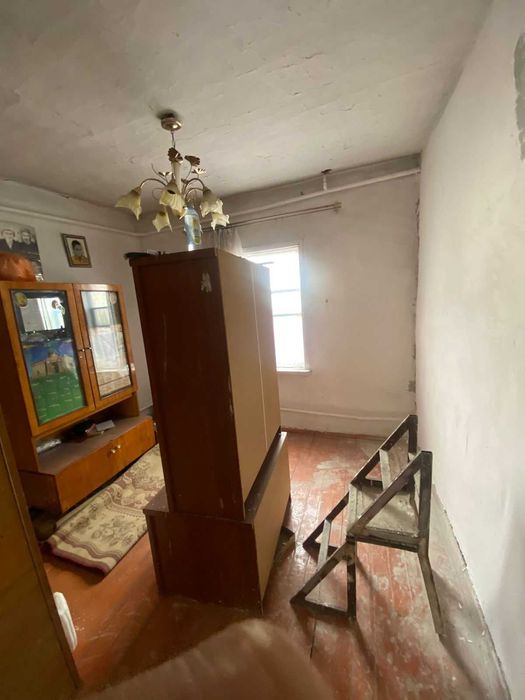 Дом, улица Калиева, Танат Империя