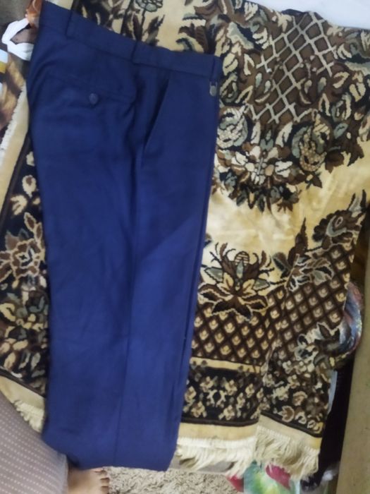 Продам брюки школьные синего цвета