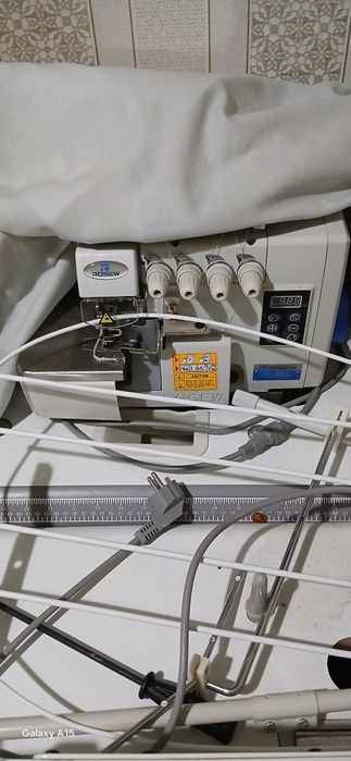 Tikuv mashina va averlo holati yengi