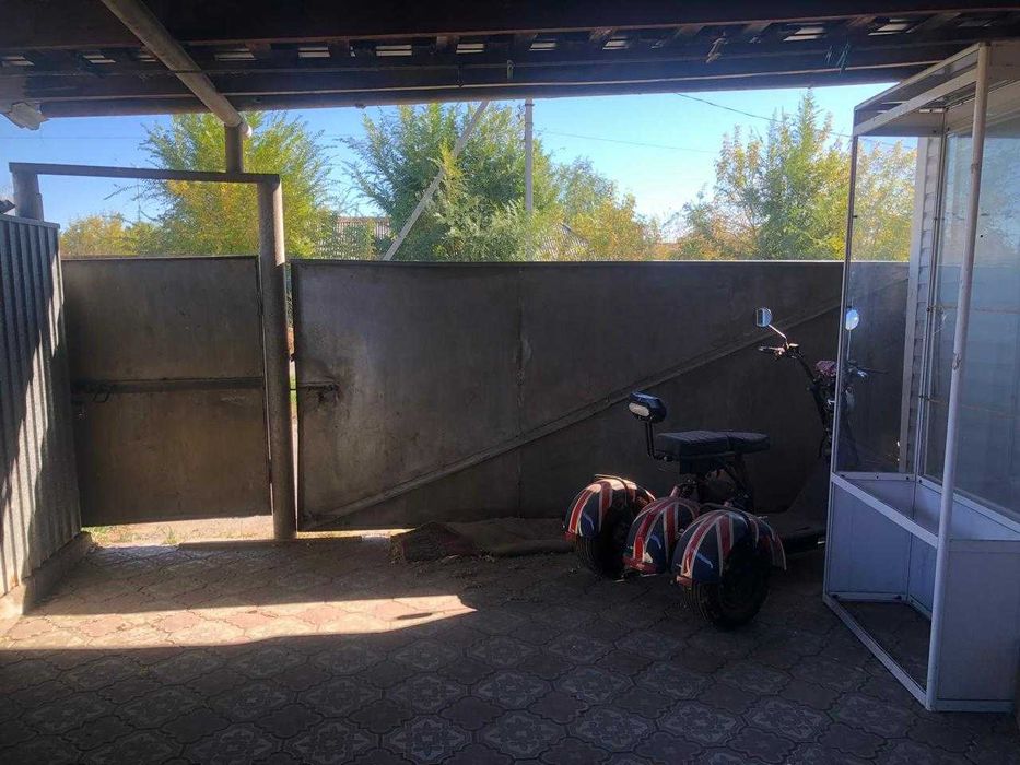 Продам дом в городе с магазином по ул. Карла Маркса