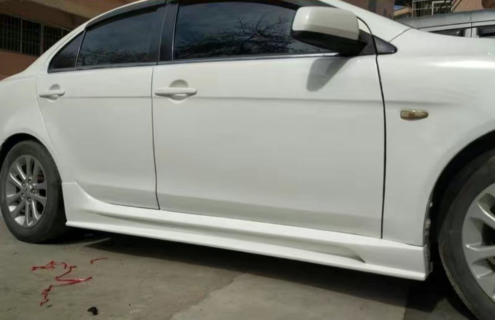 Продам накладки порога для Lancer X