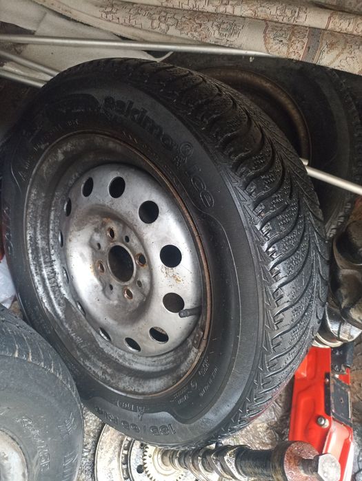 Шины с диском на Опель