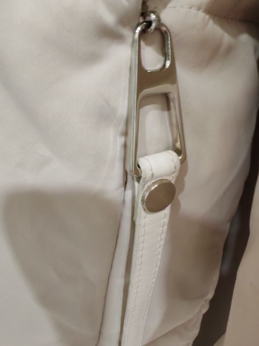 Пуховики женские