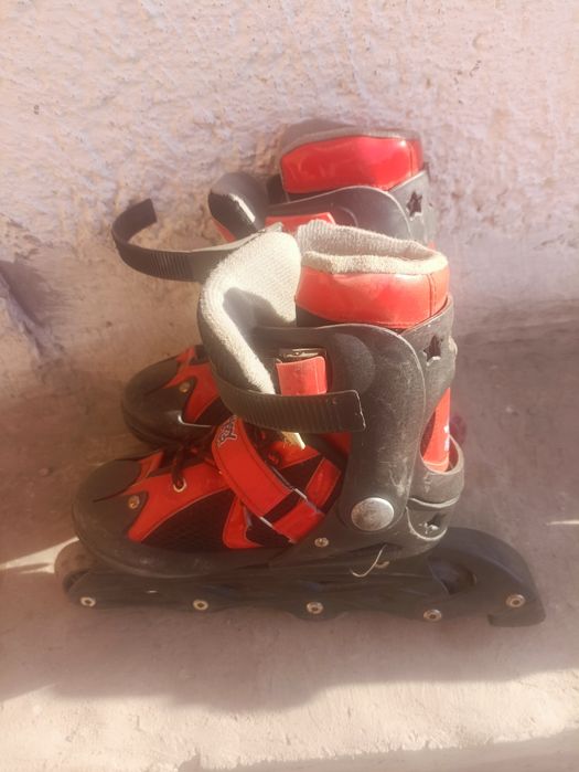 Роликовые коньки