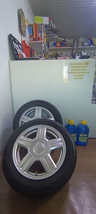 Диски шинами балон торус 4*100  Р15