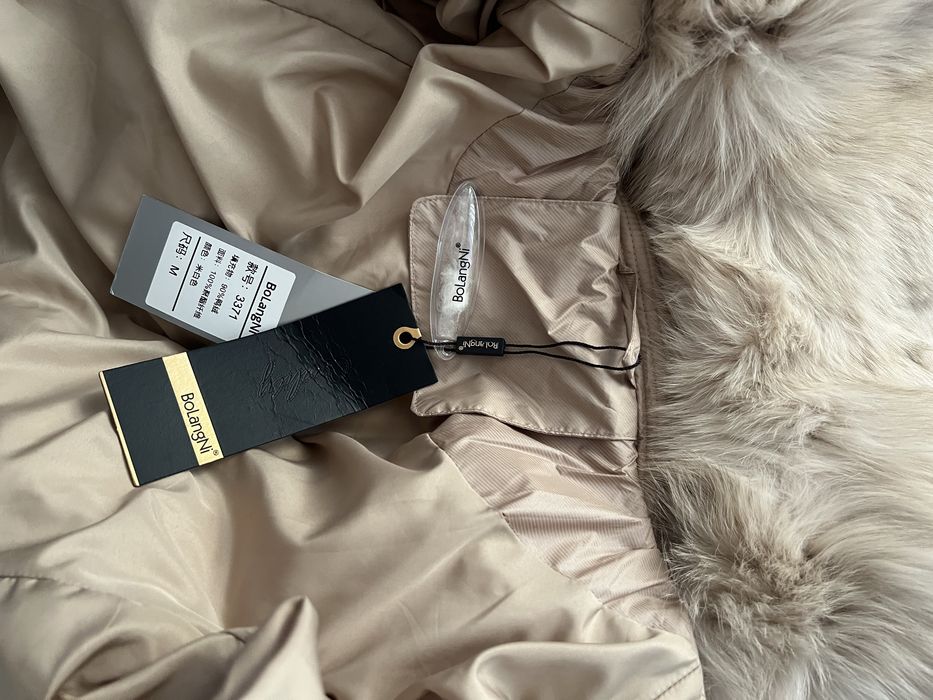 Продам новый пуховик